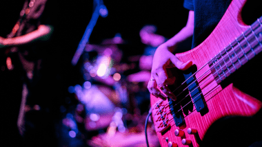 Up close image of a guitar.