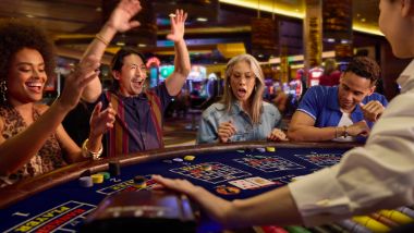 group playing table games