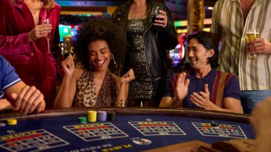 woman winning at table games